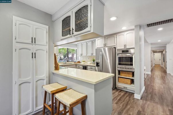 Interior, Kitchen, Recessed Lighting, Stainless Steel Appliances, Wood Texture Flooring