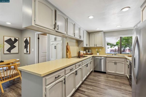 Interior, Kitchen, Recessed Lighting, Stainless Steel Appliances, Wood Texture Flooring