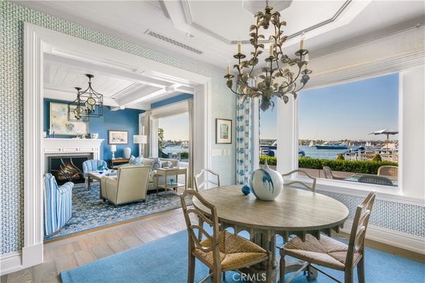 Chandelier, Dining room, Fireplace, Interior, Living room, Water, Wood Texture Flooring