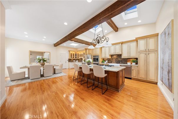 Chandelier, Dining room, Interior, Kitchen, Pendant Lights, Recessed Lighting, Wooden Beams, Wood Texture Flooring