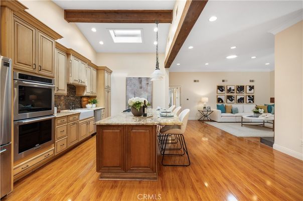 Dining room, Interior, Kitchen, Living room, Pendant Lights, Recessed Lighting, Stainless Steel Appliances, Wooden Beams, Wood Texture Flooring