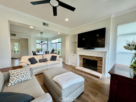 Dining room, Fireplace, Interior, Living room, Pendant Lights, Recessed Lighting, Wood Texture Flooring