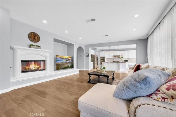 Fireplace, Interior, Pendant Lights, Recessed Lighting, Wood Texture Flooring