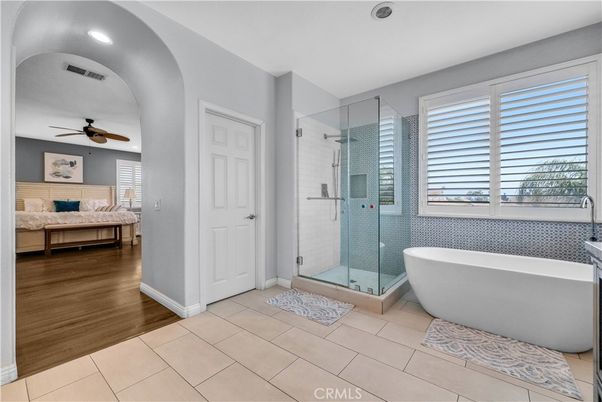 Bathroom, Bedroom, Free Standing Baths, Glass Shower, Interior, Recessed Lighting, Wood Texture Flooring
