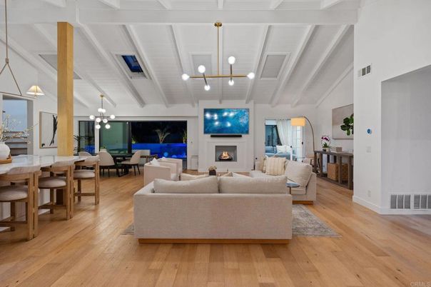 Chandelier, Dining room, Fireplace, Interior, Living room, Pendant Lights, Wood Texture Flooring