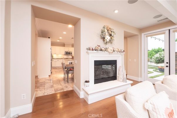 Dining room, Fireplace, Interior, Kitchen, Recessed Lighting, Stainless Steel Appliances, Wood Texture Flooring
