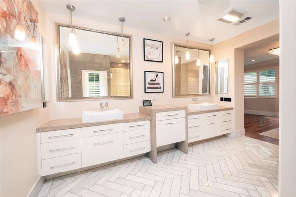 Bathroom, Dual Sink Vanities, Interior, Pendant Lights, Recessed Lighting, Wood Texture Flooring