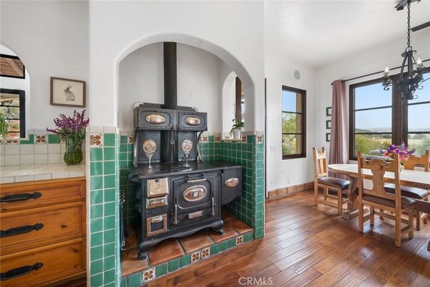 Dining room, Fireplace, Interior, Pendant Lights, Wood Texture Flooring