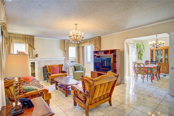 Chandelier, Dining room, Fireplace, Interior, Living room