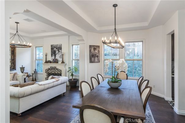 Chandelier, Dining room, Fireplace, Interior, Living room, Pendant Lights, Wood Texture Flooring