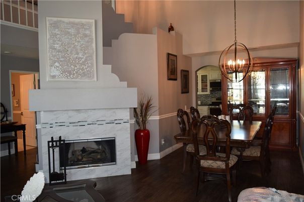 Chandelier, Dining room, Fireplace, Interior, Pendant Lights, Wood Texture Flooring