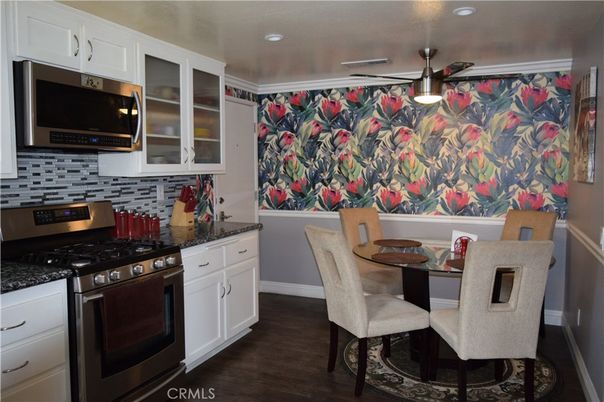 Dining room, Interior, Kitchen, Recessed Lighting, Stainless Steel Appliances, Wood Texture Flooring