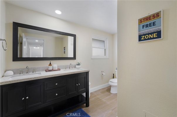 Bathroom, Dual Sink Vanities, Interior, Recessed Lighting, Wood Texture Flooring
