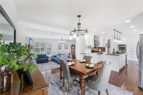 Dining room, Interior, Kitchen, Living room, Pendant Lights, Recessed Lighting, Stainless Steel Appliances, Wood Texture Flooring