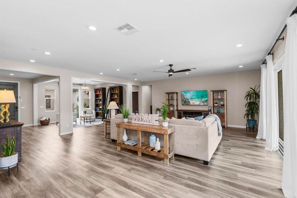 Dining room, Fireplace, Interior, Living room, Recessed Lighting, Wood Texture Flooring