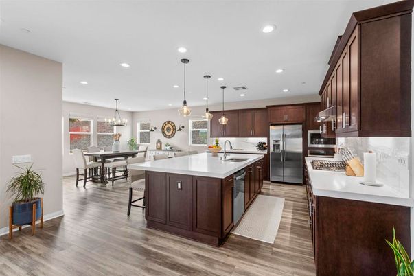Dining room, Interior, Kitchen, Pendant Lights, Recessed Lighting, Stainless Steel Appliances, Wood Texture Flooring
