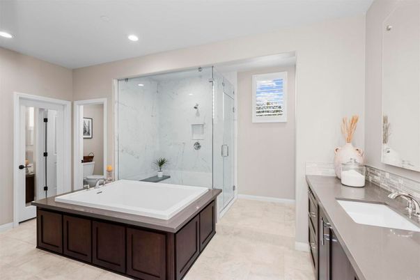 Bathroom, Dual Sink Vanities, Glass Shower, Interior, Marble, Marble Walls, Recessed Lighting