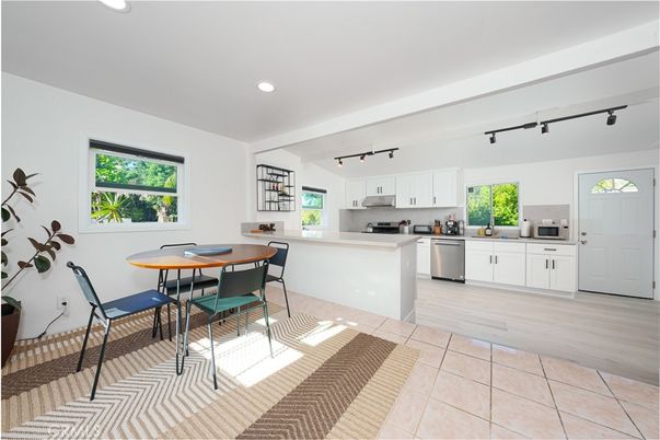 Dining room, Interior, Kitchen, Recessed Lighting, Stainless Steel Appliances, Wood Texture Flooring