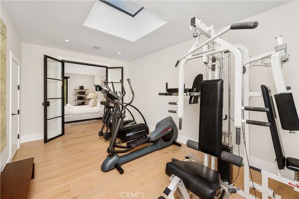Bedroom, Fitness Equipment, Interior, Recessed Lighting, Wood Texture Flooring