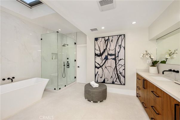Bathroom, Dual Sink Vanities, Free Standing Baths, Glass Shower, Interior, Marble Walls, Recessed Lighting