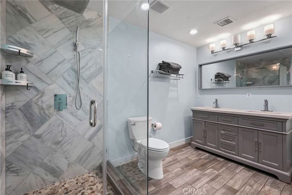 Bathroom, Glass Shower, Interior, Marble Walls, Recessed Lighting, Wood Texture Flooring