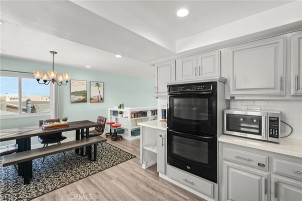 Chandelier, Dining room, Interior, Kitchen, Recessed Lighting, Water, Wood Texture Flooring