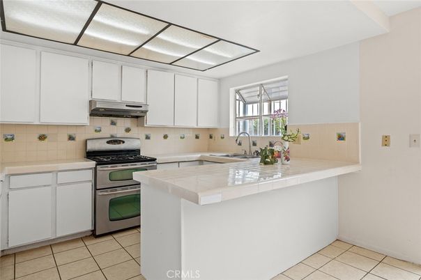 Interior, Kitchen, Stainless Steel Appliances, Tile Countertops
