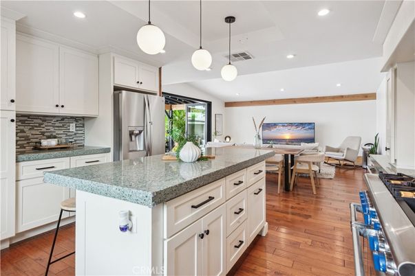 Dining room, Interior, Kitchen, Living room, Pendant Lights, Recessed Lighting, Stainless Steel Appliances, Wood Texture Flooring