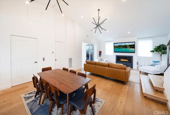 Dining room, Fireplace, Interior, Living room, Pendant Lights, Recessed Lighting, Wood Texture Flooring