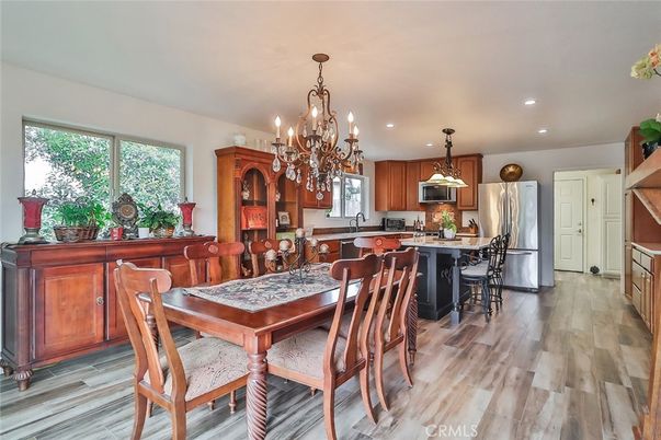 Chandelier, Dining room, Interior, Kitchen, Recessed Lighting, Stainless Steel Appliances, Wood Texture Flooring