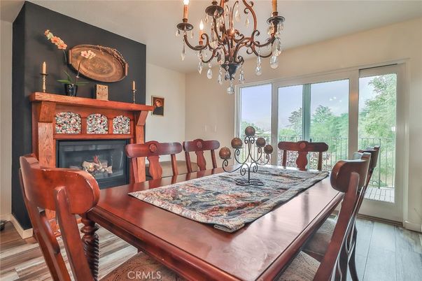 Chandelier, Dining room, Fireplace, Interior, Wood Texture Flooring