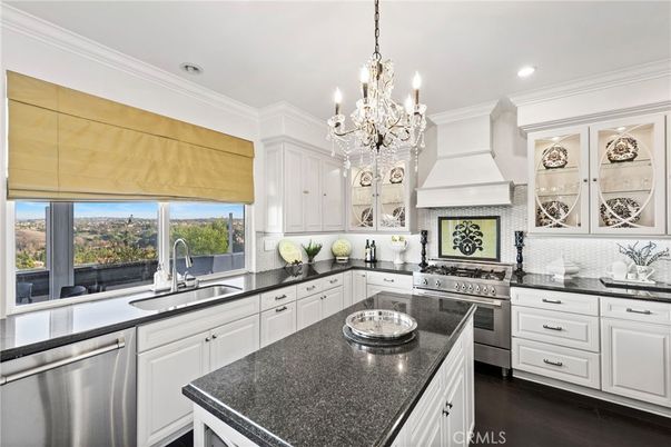 Chandelier, Interior, Kitchen, Recessed Lighting, Stainless Steel Appliances, Wood Texture Flooring