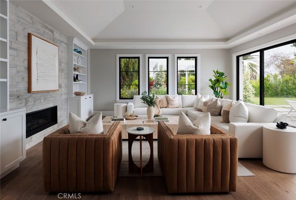 Fireplace, Interior, Living room, Recessed Lighting, Stone Walls, Wood Texture Flooring