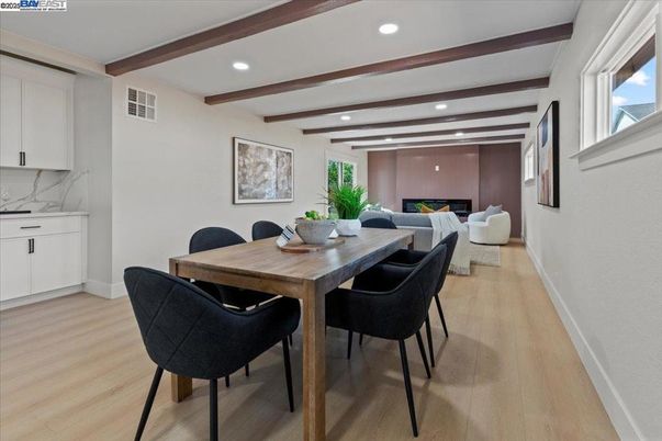 Dining room, Fireplace, Interior, Living room, Recessed Lighting, Wooden Beams, Wood Texture Flooring