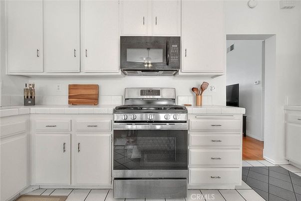 Interior, Kitchen, Stainless Steel Appliances, Tile Countertops