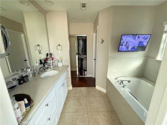 Bathroom, Dual Sink Vanities, Interior, Recessed Lighting, Wood Texture Flooring
