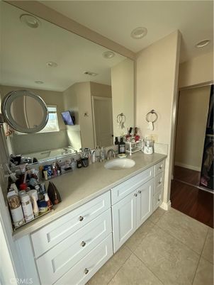Bathroom, Dual Sink Vanities, Interior, Recessed Lighting, Wood Texture Flooring