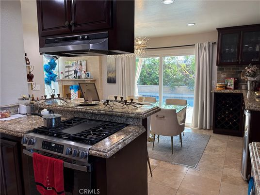 Chandelier, Dining room, Interior, Kitchen, Pendant Lights, Recessed Lighting, Stainless Steel Appliances