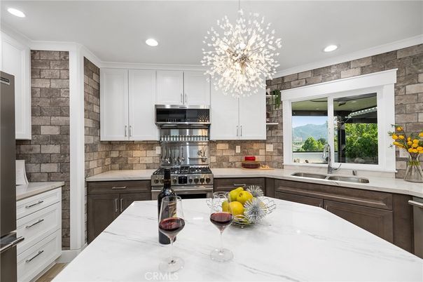 Interior, Kitchen, Pendant Lights, Recessed Lighting, Stainless Steel Appliances, Stone Walls