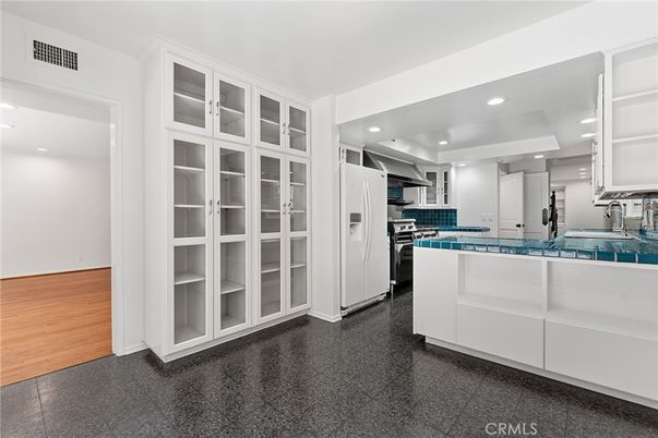 Interior, Kitchen, Recessed Lighting, Stainless Steel Appliances, Tile Countertops, Wood Texture Flooring