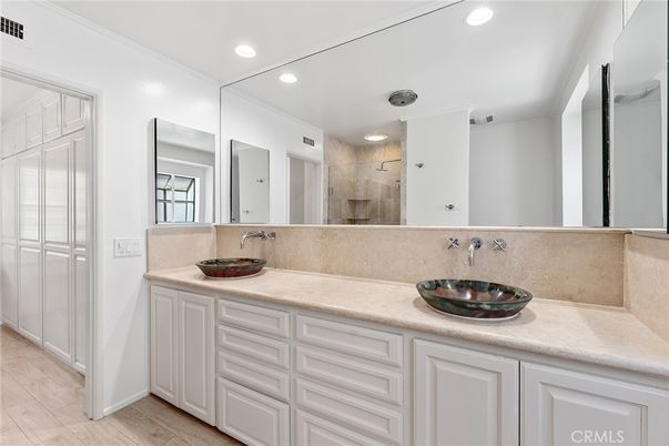Bathroom, Dual Sink Vanities, Interior, Recessed Lighting, Wood Texture Flooring