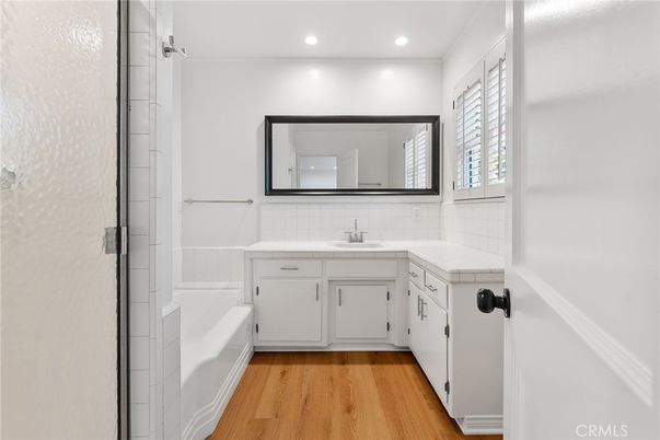 Bathroom, Interior, Recessed Lighting, Tile Countertops, Wood Texture Flooring