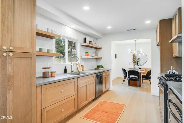 Dining room, Interior, Kitchen, Pendant Lights, Recessed Lighting, Stainless Steel Appliances, Wood Texture Flooring