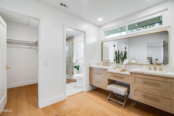 Bathroom, Dual Sink Vanities, Glass Shower, Interior, Recessed Lighting, Wood Texture Flooring