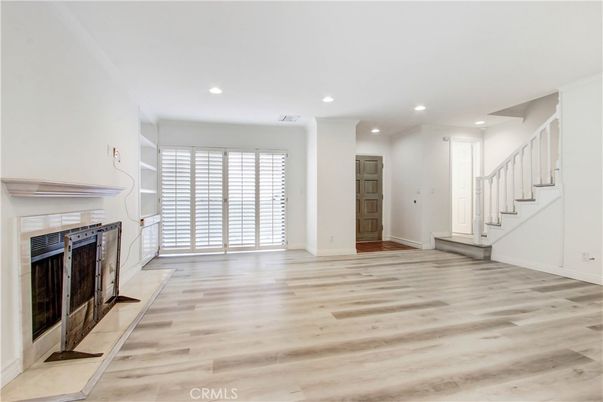 Empty room, Fireplace, Interior, Recessed Lighting, Wood Texture Flooring