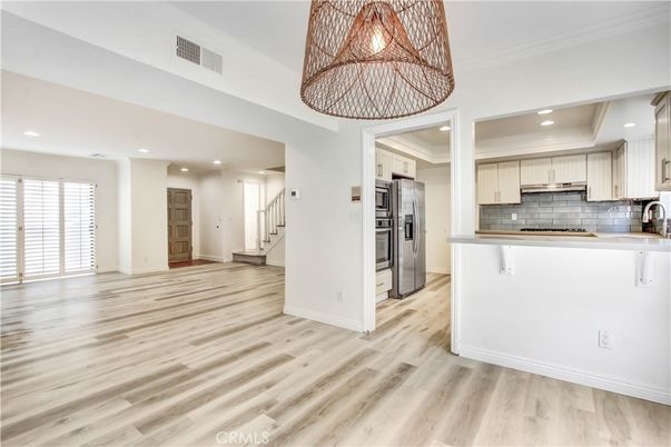 Interior, Kitchen, Pendant Lights, Recessed Lighting, Stainless Steel Appliances, Wood Texture Flooring