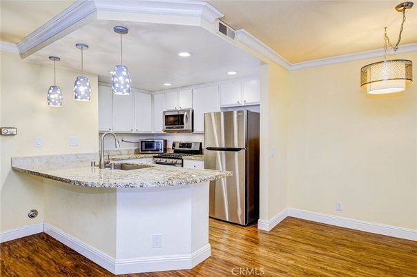 Interior, Kitchen, Pendant Lights, Recessed Lighting, Stainless Steel Appliances, Wood Texture Flooring