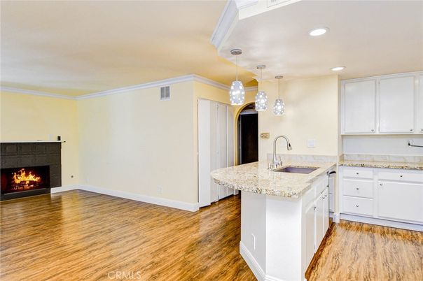 Fireplace, Interior, Kitchen, Pendant Lights, Recessed Lighting, Wood Texture Flooring