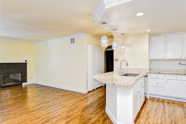 Fireplace, Interior, Kitchen, Pendant Lights, Recessed Lighting, Wood Texture Flooring
