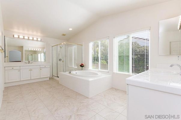 Bathroom, Dual Sink Vanities, Glass Shower, Interior, Marble, Recessed Lighting, Tile Countertops